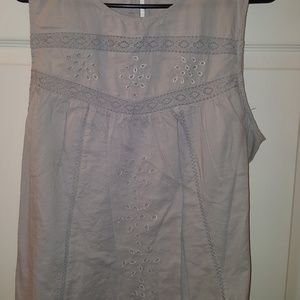 Light grey eyelet sleeveless blouse